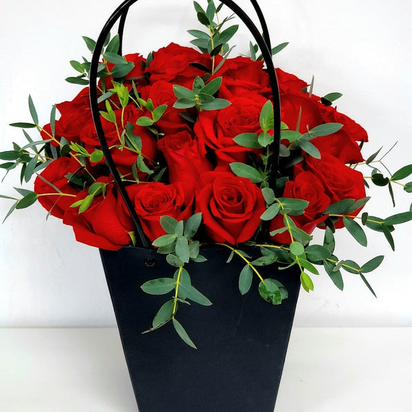 2 Dozen Red Roses in a bag